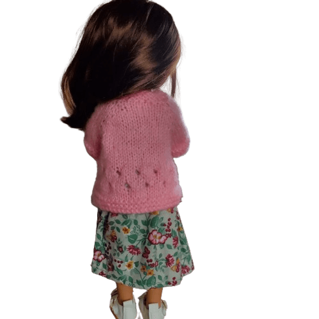 Gilet de poupée tricoté en laine rose